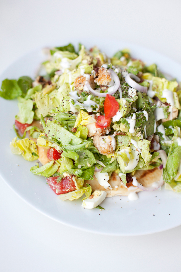 tossed cob salad on a pita