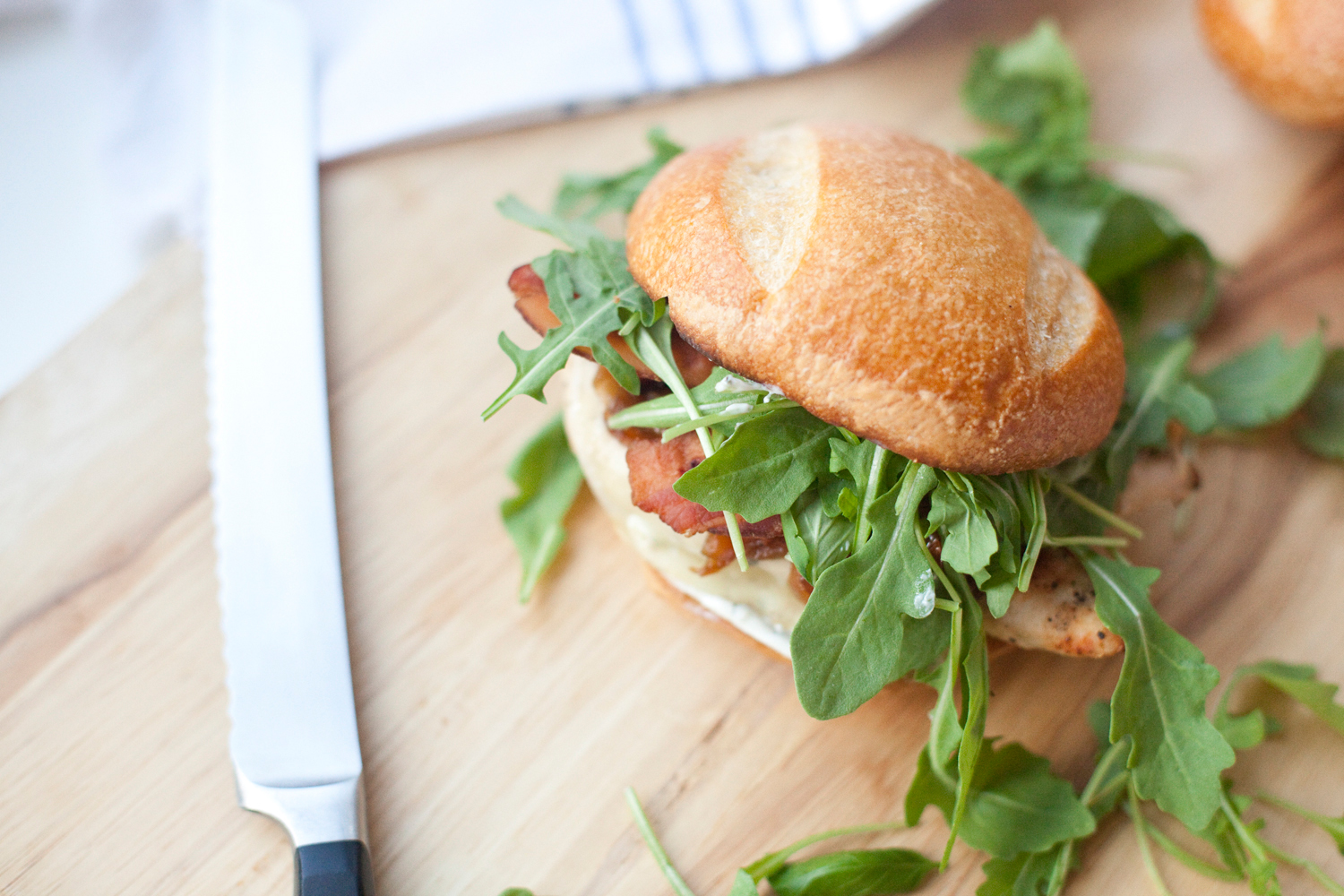 Macro Friendly Caprese Chicken Sandwich with Roasted Tomatoes and light basil garlic aioli www.lillieeatsandtellscom.bigscoots-staging.com