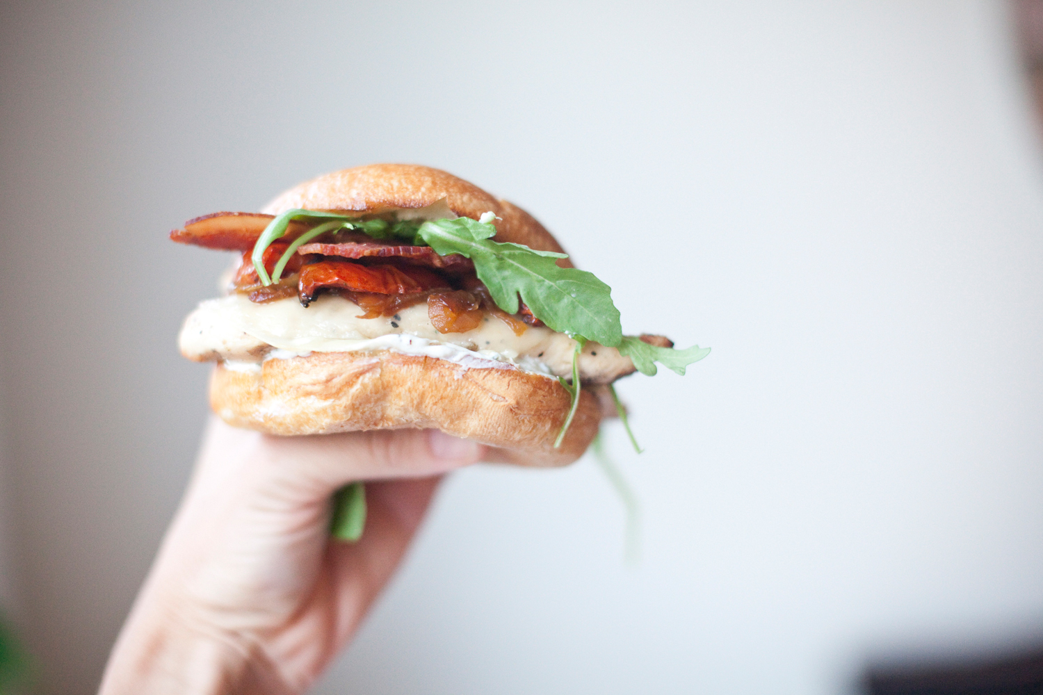 Macro Friendly Caprese Chicken Sandwich with Roasted Tomatoes and light basil garlic aioli www.lillieeatsandtellscom.bigscoots-staging.com