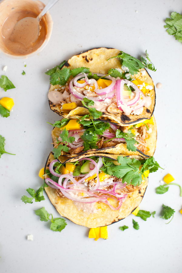 Instant pot chipotle chicken piled in tacos