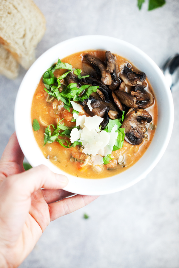 Instant Pot Creamy Tomato Chicken Soup in a bowl with mushrooms