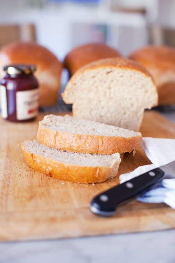 sliced loaf of homemade wheat bread www.lillieeatsandtellscom.bigscoots-staging.com