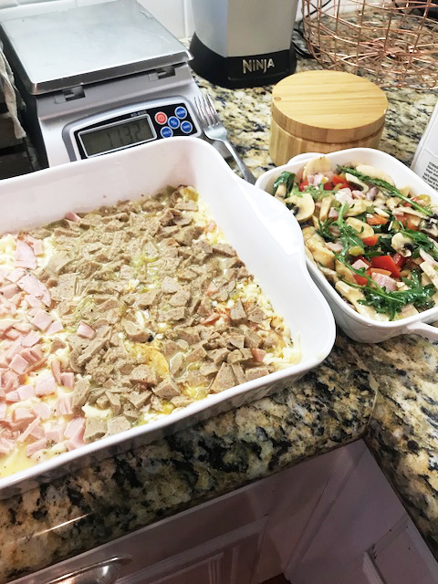 Two egg bakes ready to go in the oven