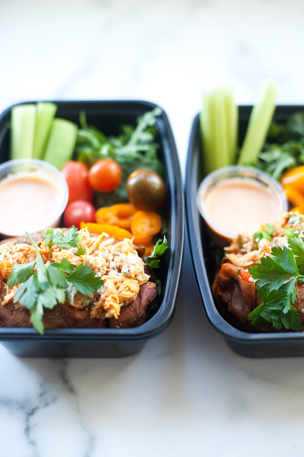 Lunch with baked sweet potato stuffed with creamy buffalo chicken and veggies on the side. www.lillieeatsandtellscom.bigscoots-staging.com
