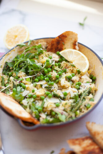 The spring flavors are delicious in this skillet meal with spaghetti squash and asparagus. www.lillieeatsandtellscom.bigscoots-staging.com