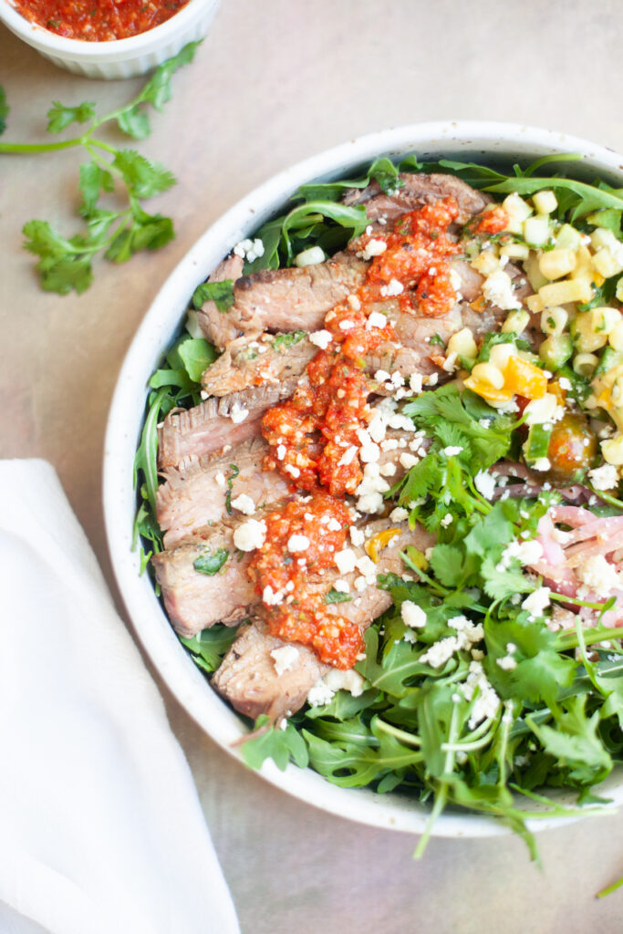 Lillie Eats and Tells Steak and Arugula Salad with crumbled blue cheese www.lillieeatsandtellscom.bigscoots-staging.com