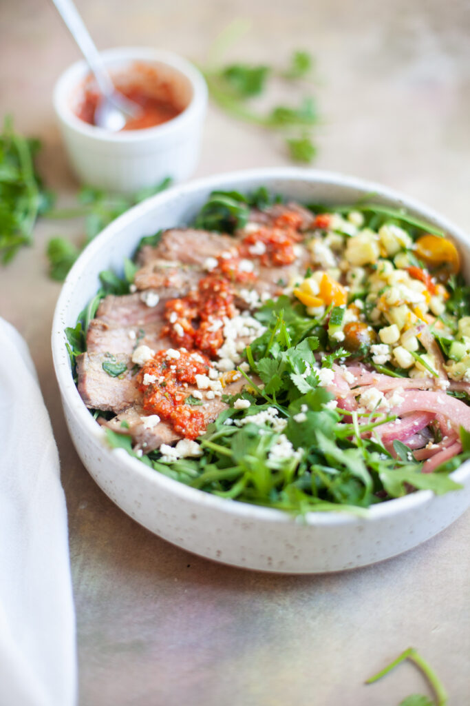 Steak and arugula salad with crumbled blue cheese from www.lillieeatsandtellscom.bigscoots-staging.com
