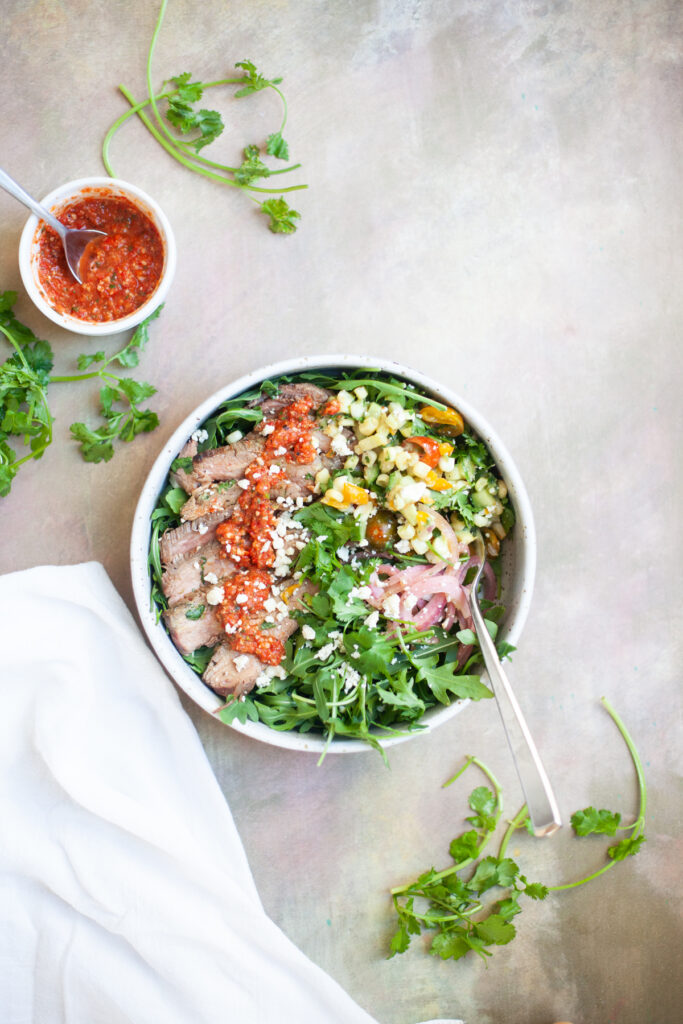 My favorite Steak and Arugula Salad with Romesco Sauce www.lillieeatsandtellscom.bigscoots-staging.com