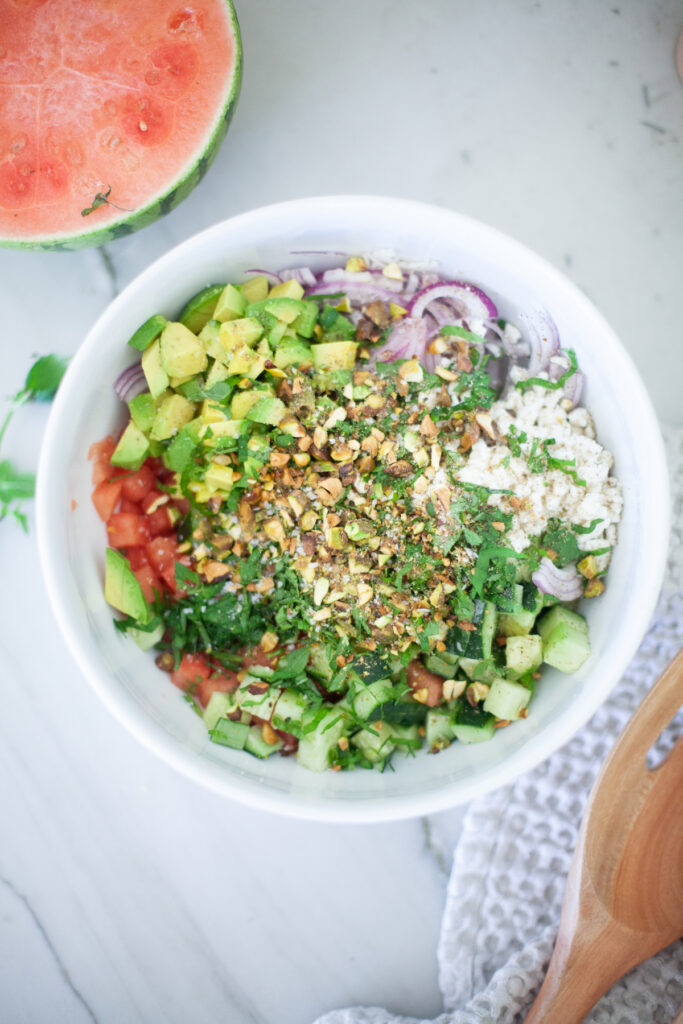 watermelon cucumber feta salad with pistachios from www.lillieeatsandtellscom.bigscoots-staging.com