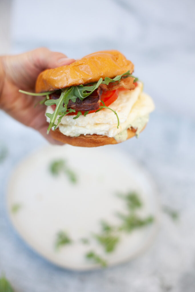 a delicious breakfast sandwich, the Tuscan egg white sandwich www.lillieeatsandtellscom.bigscoots-staging.com