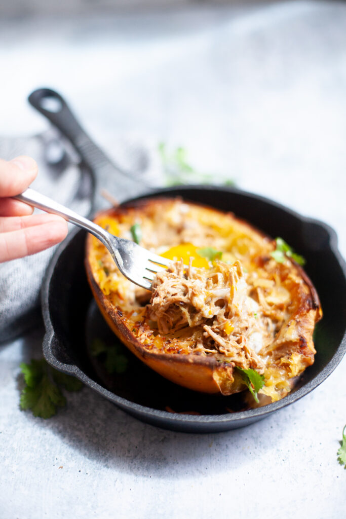 www.lillieeatsandtellscom.bigscoots-staging.com recipe for pulled pork spaghetti squash boats with a fried egg