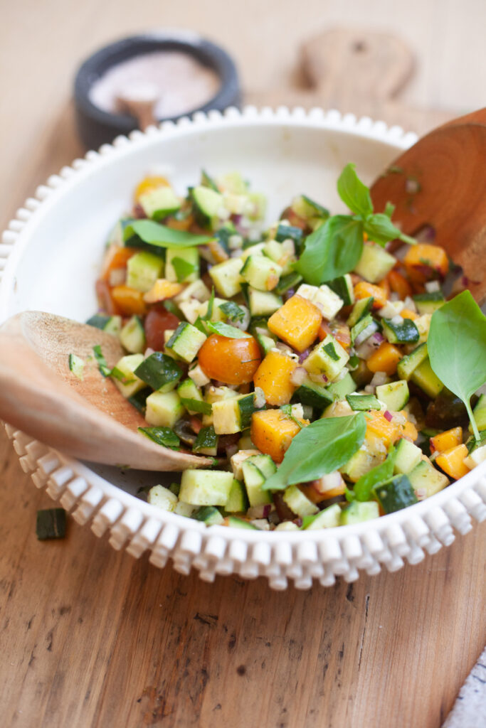 baker and olive white balsamic vinegar served on a peach chopped caprese salad by www.lillieeatsandtellscom.bigscoots-staging.com