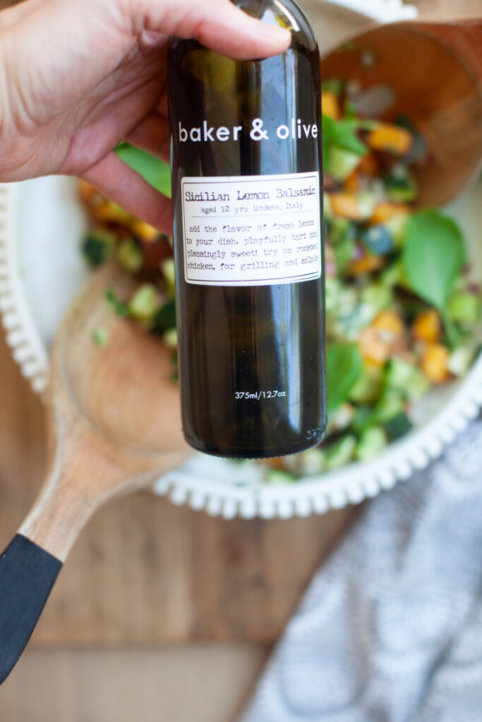 baker and olive white balsamic vinegar served on a peach chopped caprese salad by www.lillieeatsandtellscom.bigscoots-staging.com