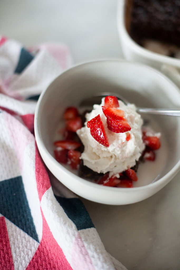 macro friendly recipe for brownie baked squash oats with vegan whipped cream and strawberries by www.lillieeatsandtellscom.bigscoots-staging.com
