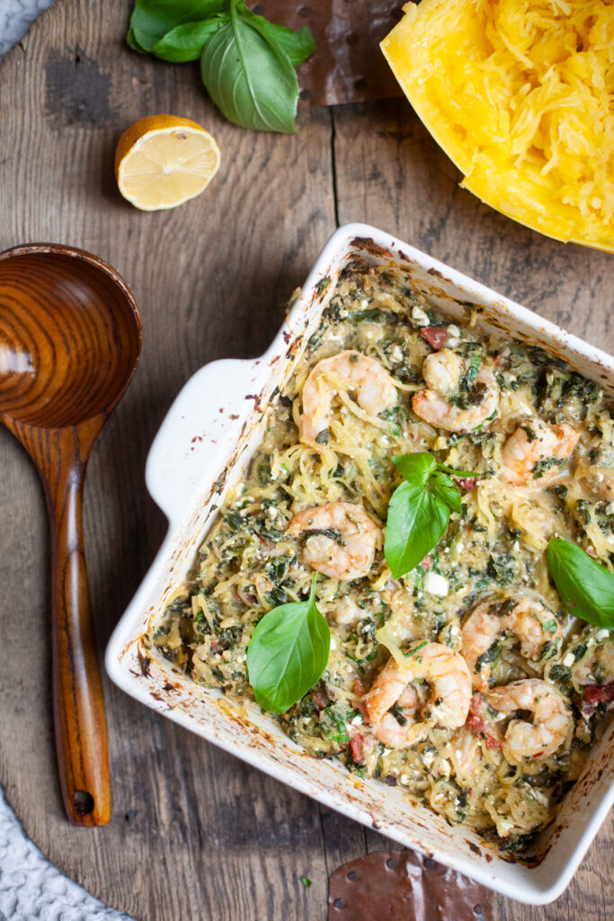 Baked Ricotta Spaghetti Squash with Shrimp in a 9x13 dish. Recipe by www.lillieeatsandtellscom.bigscoots-staging.com