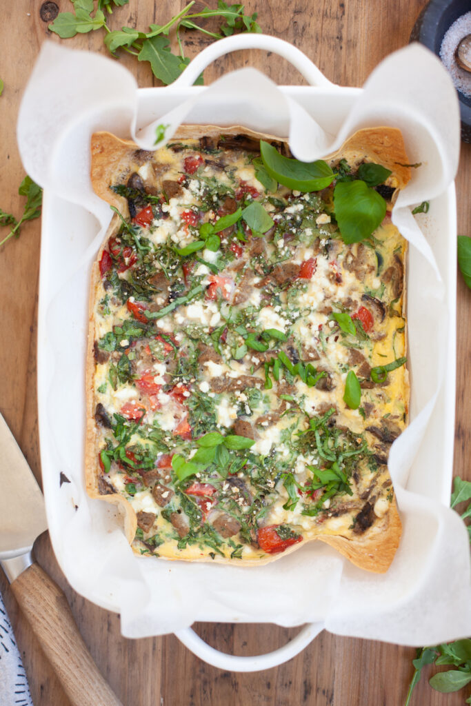 Garden Veggie Quiche for One in a white dish | recipe by www.lillieeatsandtellscom.bigscoots-staging.com