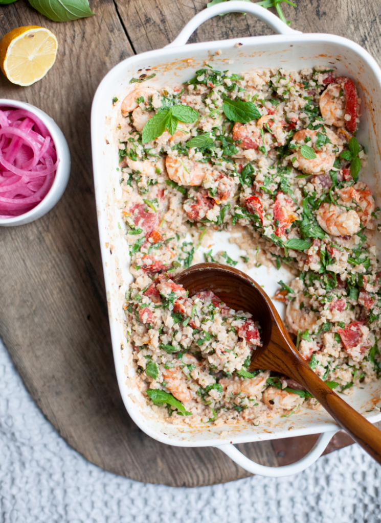 Cheesy and delicious baked cauliflower rice with feta and shrimp that fits your macros. www.lillieeatsandtellscom.bigscoots-staging.com